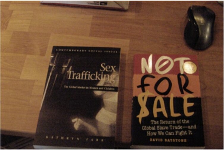 Two books about sex trafficking found at the scene